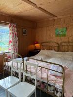 The Bungalow - Experience the 20s客房内的一张或多张床位