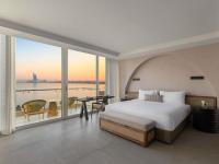 Rixos The Palm Hotel &amp; Suites - Ultra All Inclusive客房内的一张或多张床位