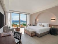 Rixos The Palm Hotel &amp; Suites - Ultra All Inclusive客房内的一张或多张床位