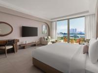 Rixos The Palm Hotel &amp; Suites - Ultra All Inclusive客房内的一张或多张床位