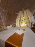 Dosplaya Ecocamp客房内的一张或多张床位