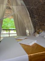 Dosplaya Ecocamp客房内的一张或多张床位