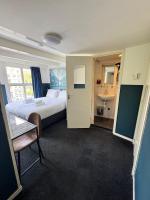 Hotel Hoksbergen客房内的一张或多张床位