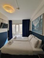 Hotel Hoksbergen客房内的一张或多张床位