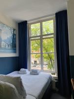Hotel Hoksbergen客房内的一张或多张床位