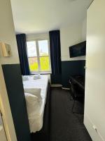 Hotel Hoksbergen客房内的一张或多张床位