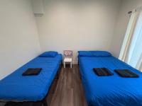 The Blue Hostel客房内的一张或多张床位