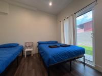The Blue Hostel客房内的一张或多张床位