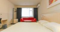 Jinjiang Inn Changchun Hongqi Street客房内的一张或多张床位