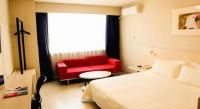 Jinjiang Inn Changchun Hongqi Street客房内的一张或多张床位