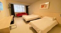 Jinjiang Inn Changchun Hongqi Street客房内的一张或多张床位