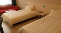 Jinjiang Inn Changchun Hongqi Street客房内的一张或多张床位