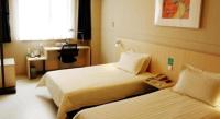 Jinjiang Inn Changchun Hongqi Street客房内的一张或多张床位