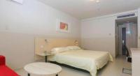 Jinjiang Inn Changchun Hongqi Street客房内的一张或多张床位