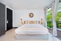 Kata Station Boutique Hotel客房内的一张或多张床位