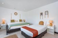Kata Station Boutique Hotel客房内的一张或多张床位