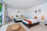 Kata Station Boutique Hotel客房内的一张或多张床位