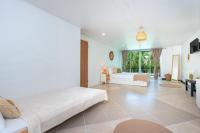 Kata Station Boutique Hotel客房内的一张或多张床位