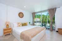 Kata Station Boutique Hotel客房内的一张或多张床位