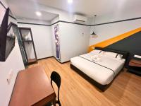 Seeds Hotel Damansara Pelangi客房内的一张或多张床位