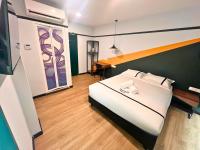 Seeds Hotel Damansara Pelangi客房内的一张或多张床位