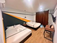Seeds Hotel Damansara Pelangi客房内的一张或多张床位