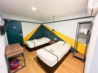Seeds Hotel Damansara Pelangi客房内的一张或多张床位