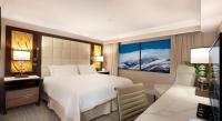 Peppermill Resort Spa Casino客房内的一张或多张床位