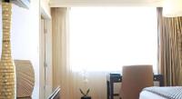Harrahs Hotel Reno的电视和&#47;或娱乐中心