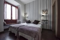 Alvaro de Torres Boutique客房内的一张或多张床位
