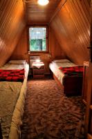 Camping Pod Krokwią客房内的一张或多张床位