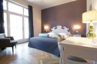 Das REGINA Boutiquehotel客房内的一张或多张床位