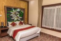 Jungle Safari Lodge- Serenity in the Wild客房内的一张或多张床位