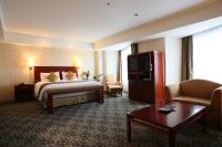International Resort Hotel Yurakujo客房内的一张或多张床位