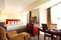 International Resort Hotel Yurakujo客房内的一张或多张床位