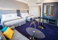 Fairway Colombo - Sri Lanka&#39;s First Hotel With Robot Technology客房内的一张或多张床位