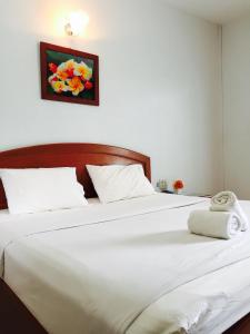 潘禅广场酒店客房内的一张或多张床位