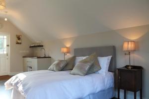 The Loft, Apple Lodge & Blossom Lodge客房内的一张或多张床位