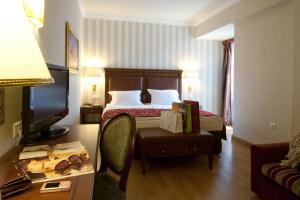 雅典伊莱克特拉酒店客房内的一张或多张床位