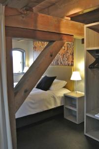 Fletcher Hotel-Restaurant Kasteel Coevorden客房内的一张或多张床位