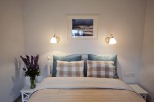 Smėlynas Neringa Apartments客房内的一张或多张床位