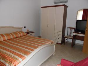 Hotel Coste Del Lago客房内的一张或多张床位