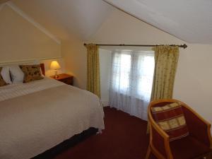 鲁特维迪格阿尔穆斯酒店客房内的一张或多张床位