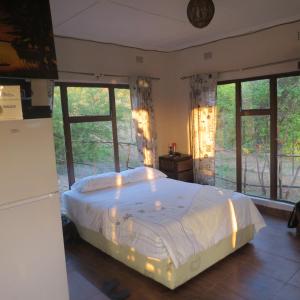 Mount Hermon Safari Cottages客房内的一张或多张床位