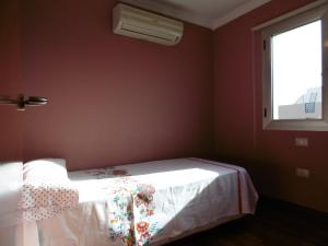 Haus Gran Canaria客房内的一张或多张床位