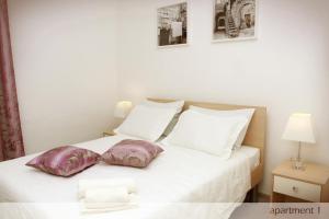 Apartmani Murtilica客房内的一张或多张床位