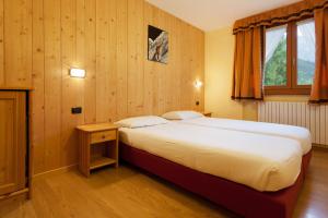 斯特雷狄内维小木屋酒店客房内的一张或多张床位