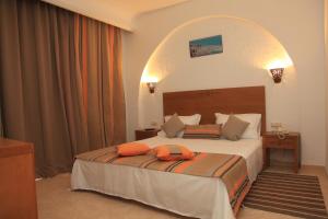 梅纳拉酒店客房内的一张或多张床位
