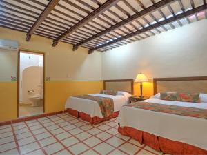 Hotel Luz en Yucatan客房内的一张或多张床位