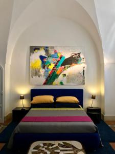 莱切ART TO DESIGN B&B的一间卧室配有一张壁画床